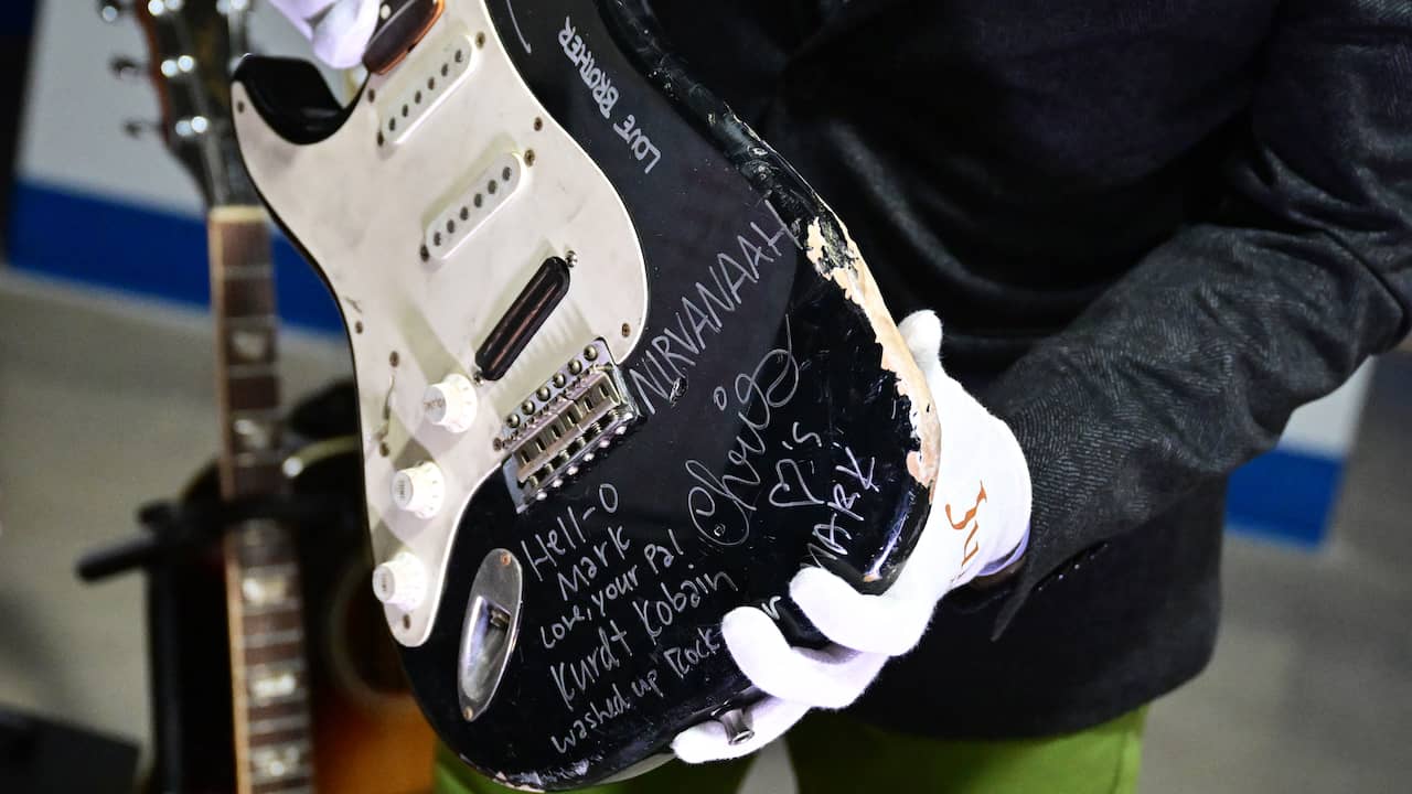 “Smashed Kurt Cobain Guitar Sells for 10 Times Expected Amount at Auction”