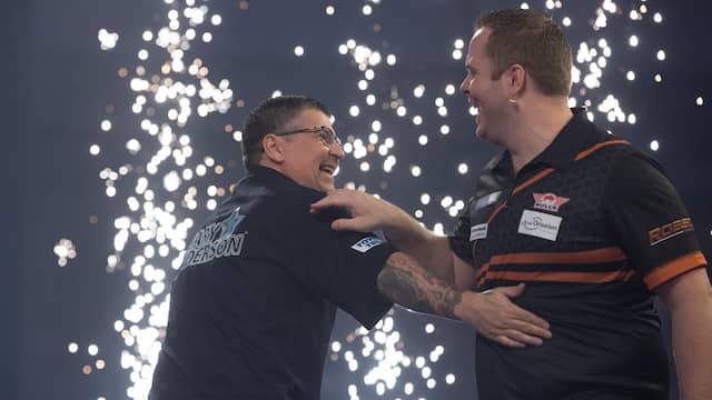 Dirk van Duijvenbode and Gary Anderson have fun with each other.