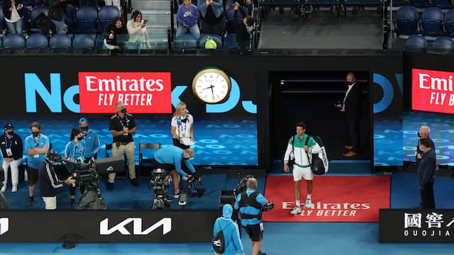 Novak Djokovic entered the Rod Laver Arena with spectators in the stands.