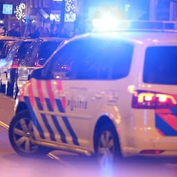 Bestuurder motorscooter en fietser gewond na botsing Kinkerstraat