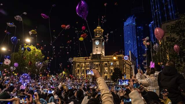Residents of Wuhan ring in the new year en masse.