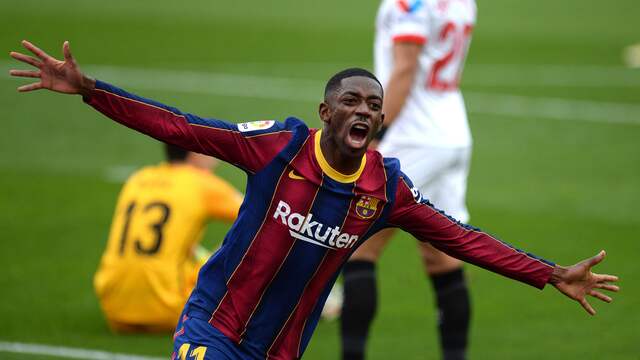 Dembélé juicht na zijn openingstreffer tegen Sevilla.