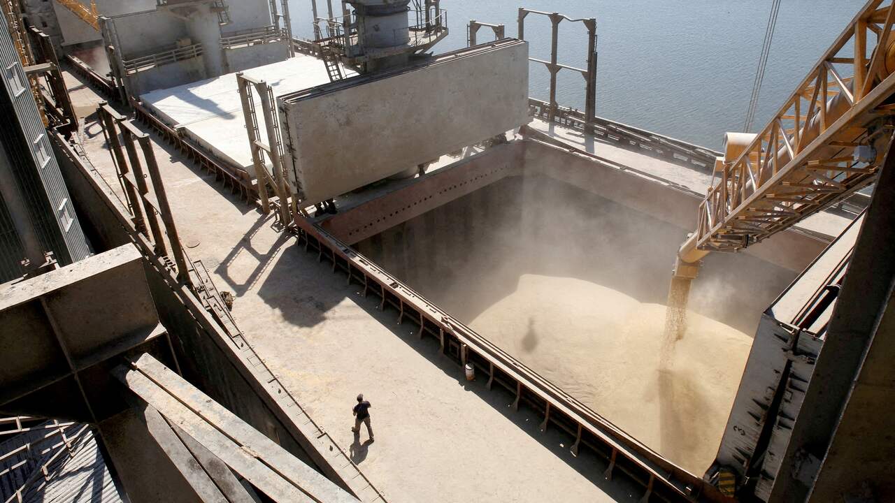 A Ukrainian freighter is loaded with grain.