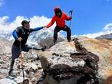 Bergbeklimmer zonder onderbenen bereikt top Mount Everest