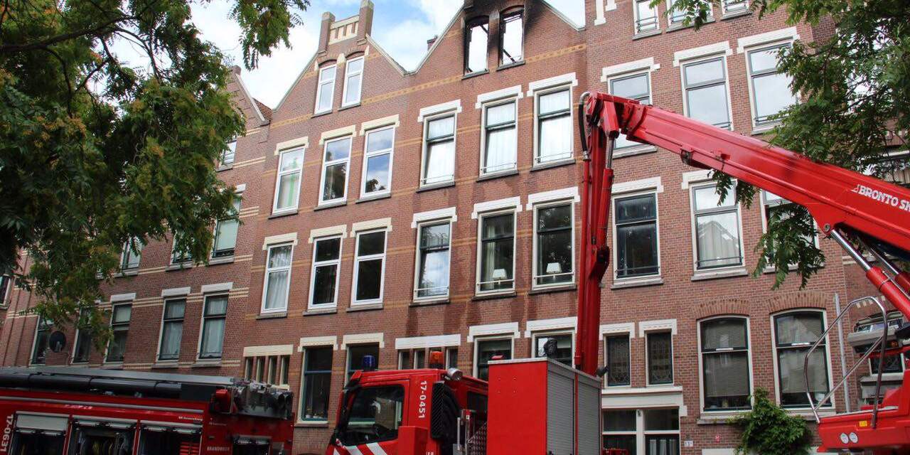 Gewonde man uit brandende woning Rotterdam overleden