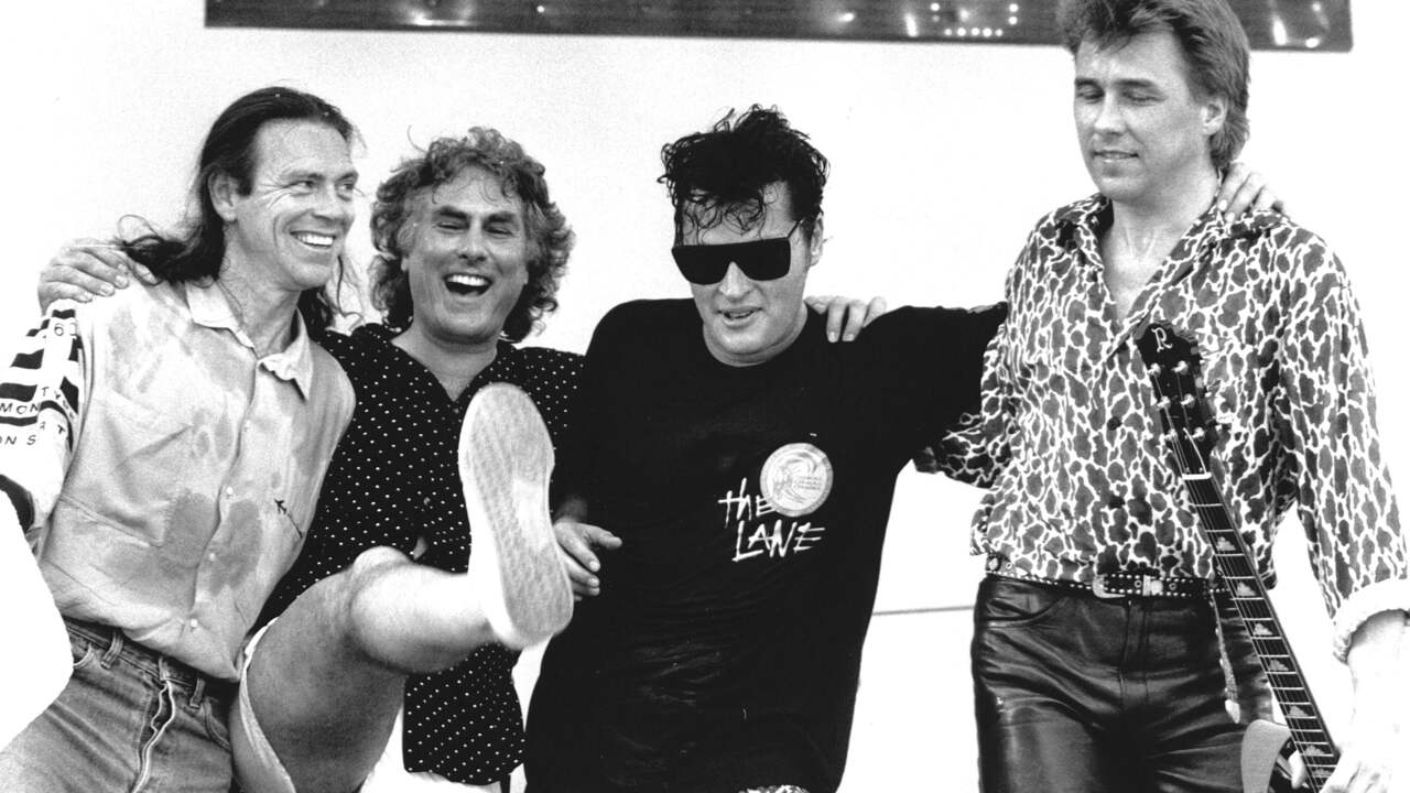 Golden Earring tijdens Parkpop (1989). Van links naar rechts: Rinus Gerritse, Cesar Zuiderwijk, Barry Hay en George Kooymans.