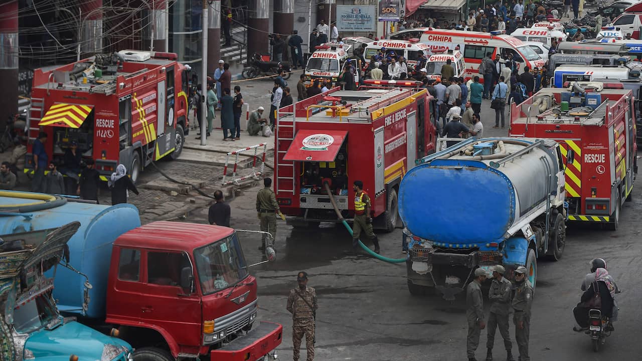 At least 11 people were killed and dozens injured in a major fire in a Pakistani shopping mall |  outside