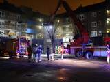 Woningen ontruimd bij brand in supermarkt in Houtwijk