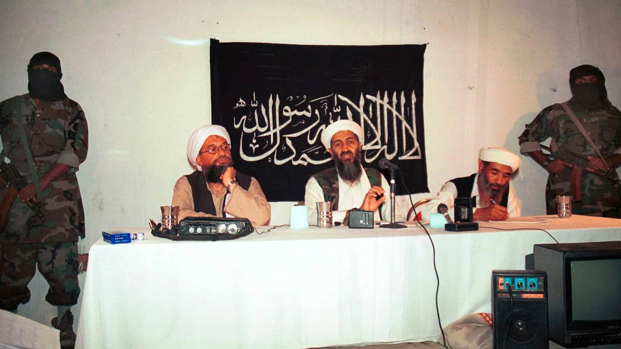 An archive photo of Ayman al-Zawahiri with Osama bin Laden to his right.