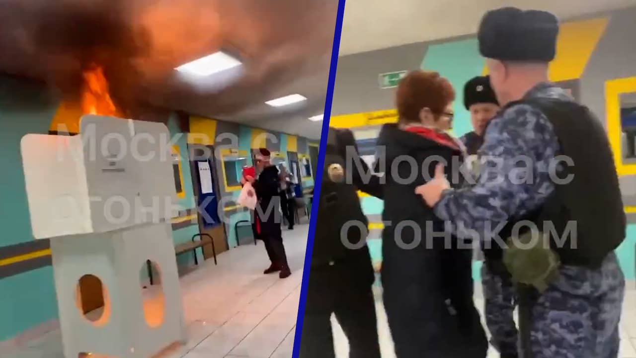 Beeld uit video: Vrouw steekt stemhokje in brand in Moskou en wordt opgepakt