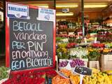 Miljardste contactloze betaling bij bloemenkiosk Amsterdam