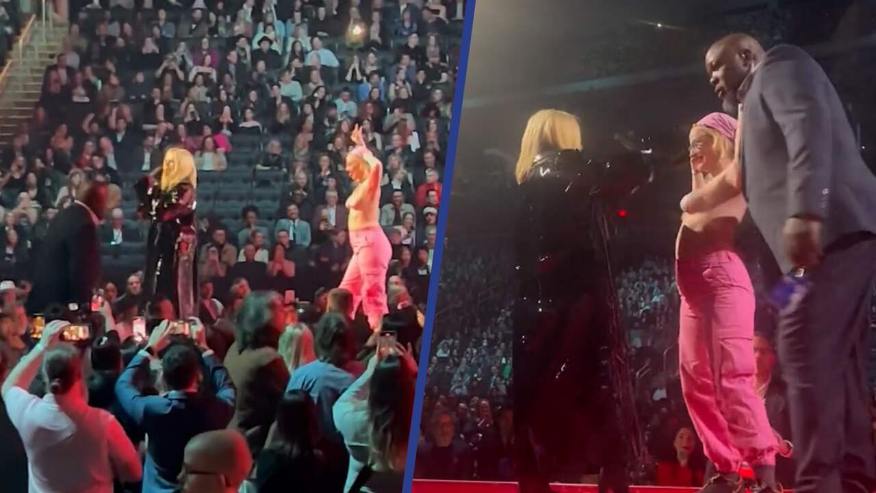 Beeld uit video: Topless activist verstoort speech Avril Lavigne in Canada