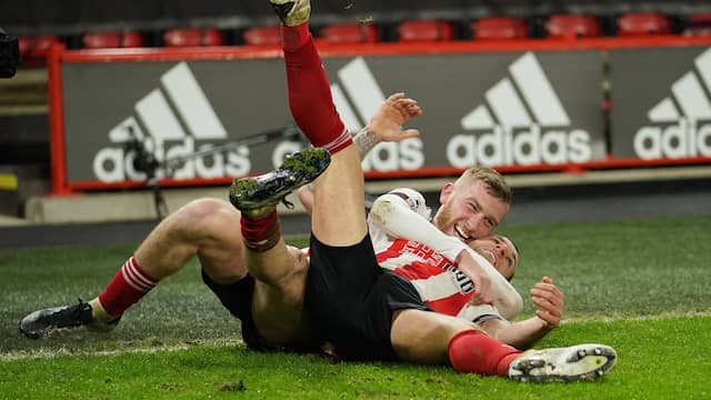 Dolle vreugde bij Sheffield United na de 1-2 van Billy Sharp.