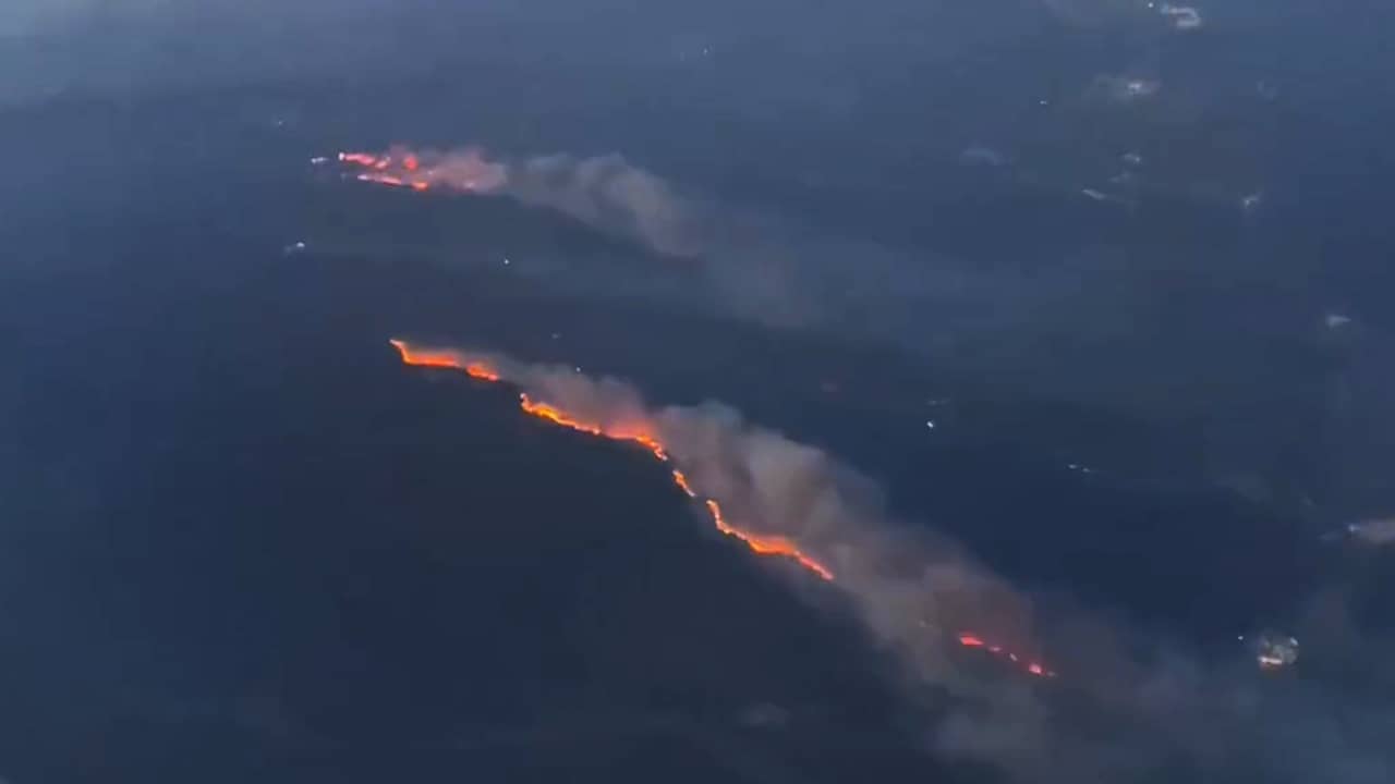 Still from video: Airline passenger filming forest fires on Rhodes