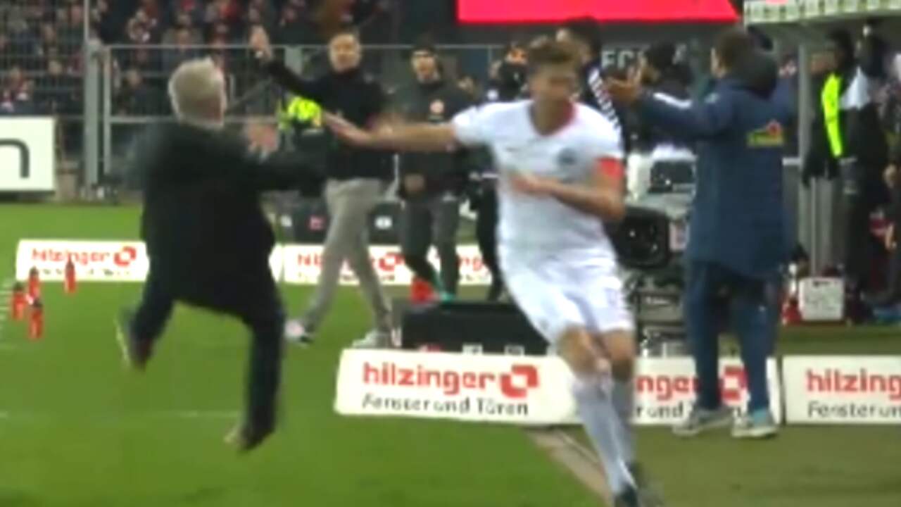 Aanvoerder van Eintracht Frankfurt beukt trainer van Freiburg omver