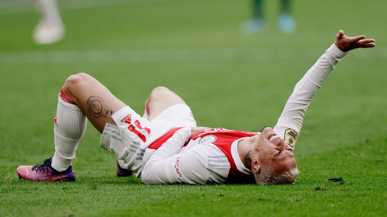 Antony is injured on the ground during the Classic against Feyenoord.