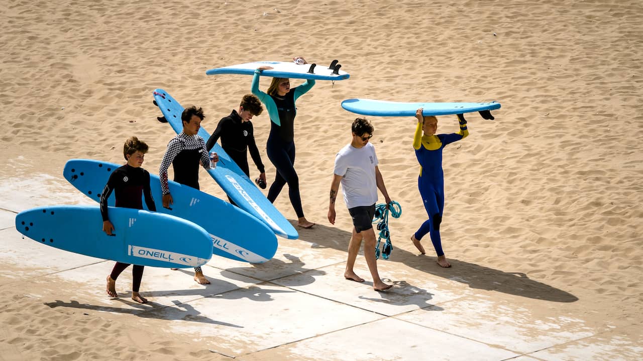 Surfers also sought out the cooling water.