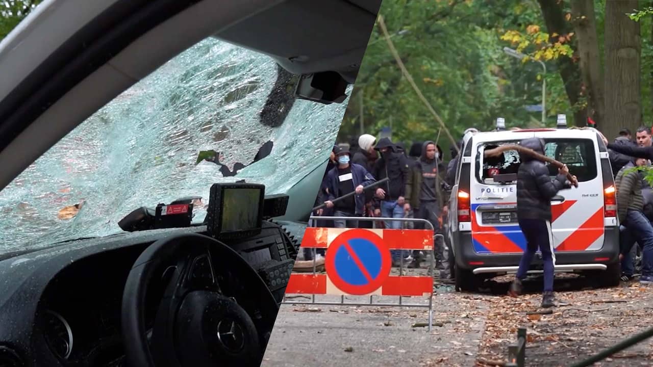 Beeld uit video: Relschoppers vernielen politiebus na derby NEC-Vitesse