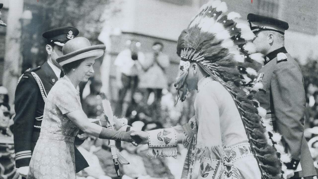 Elizabeth II greets native Canadian Chief David Ahenakew on a visit to the country in 1973.