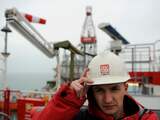 RUSSIAN FEDERATION, Astrakhan : A worker stands near a pipe on the Russian LUKOIL ice-resistant fixed platform LSP-1, built at the Astrakhansky Korabel shipyard, and intended to drill and operate wells and collect and pre-treat reservoir content at Korchagins oilfeald in the Russian sector of the Caspian Sea some 180 km outside Astrakhan, on April 10, 2011. The fields productivity of oil and gas condensate will peak at 2.3 million tonnes oil and 1.2 bcm gas per year. AFP PHOTO / MIKHAIL MORDASOV