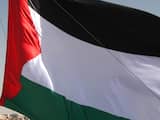 Woensdag 20 maart: Een groep Palestijnen hijst een enorme Palestijnse vlag dicht bij de Israëlische nederzetting Maale Adumin, in de buurt van Jeruzalem. De Amerikaanse president Barack Obama begon daar woensdag zijn bezoek aan het land.