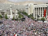 Donderdag 12 oktober: In Damascus vindt een mars plaats van supporters van de Syrische president Bashar al-Assad.
