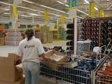 Ref. Par390748 TUNISIA, Tunis : An employee of the Geant hypermarket store, belonging to the French distribution group Casino, sorts goods 28 September 2005 in Tunis on the eve of the store's opening. AFP PHOTO / FETHI BELAID
