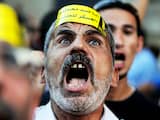 Dinsdag 20 september: Een Egyptische betoger schreeuwt leuzen tijdens een protest tegen de uitbreiding van de noodtoestand bij het kabinetsgebouw in Caïro.