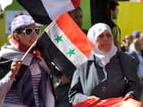 Demonstrerende vrouwen in Parijs tegen de onrusten in Syrië.