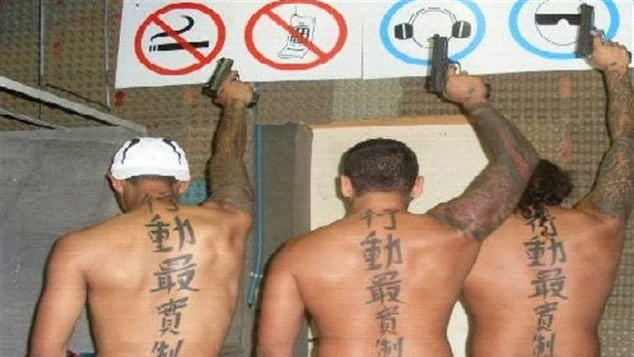 De mannen worden 'tattookillers' genoemd vanwege de Chinese tekens die ze op hun rug hebben.