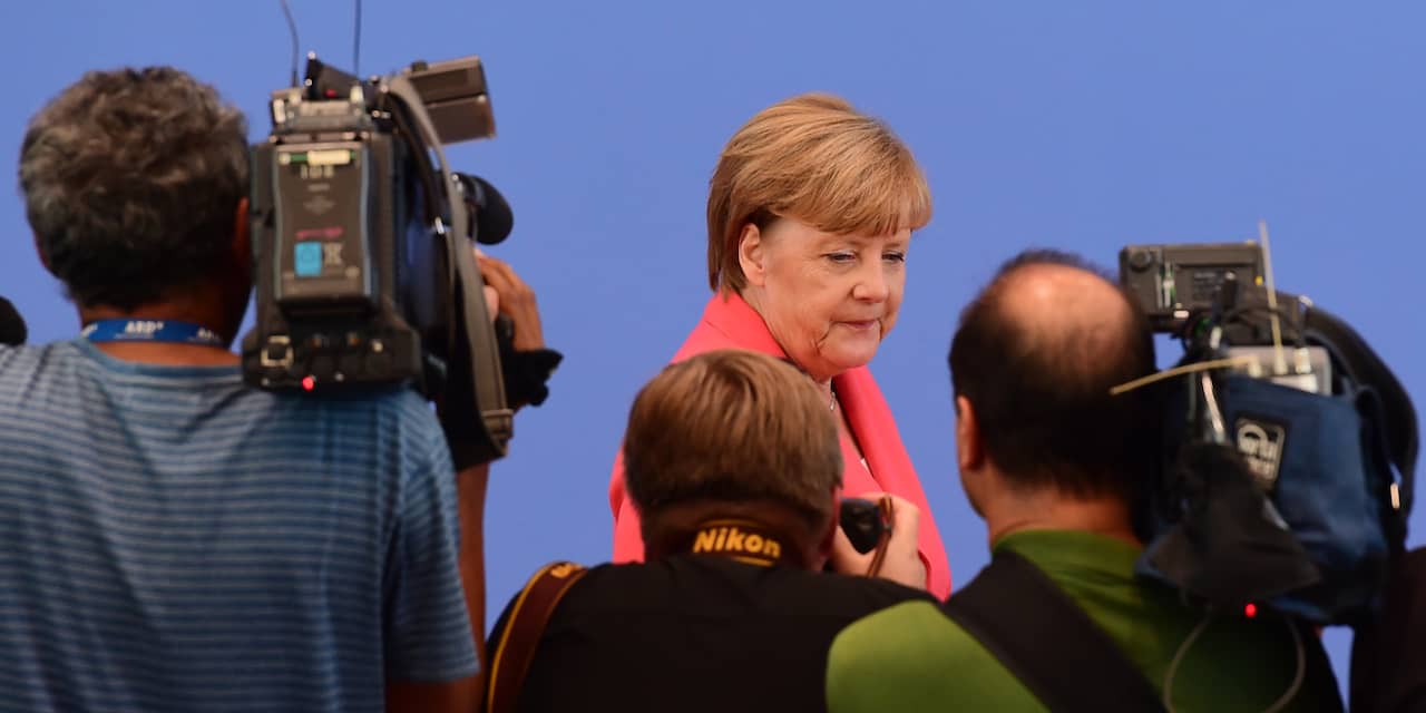 Merkel waarschuwt belagers vluchtelingen