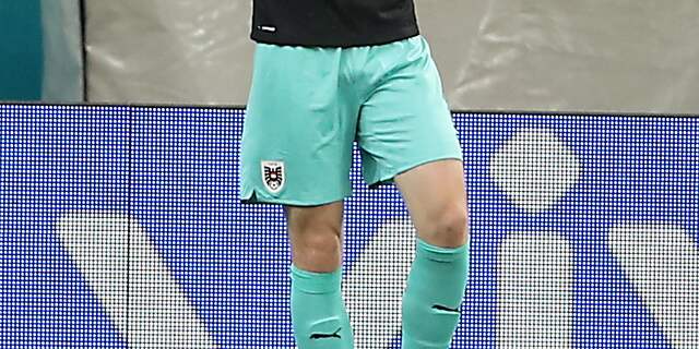 Een turquoise voetbaltenue, wie bedenkt zoiets?