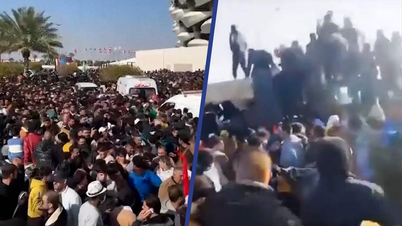 Beeld uit video: Duizenden voetbalfans verdrukken elkaar voor Iraaks stadion