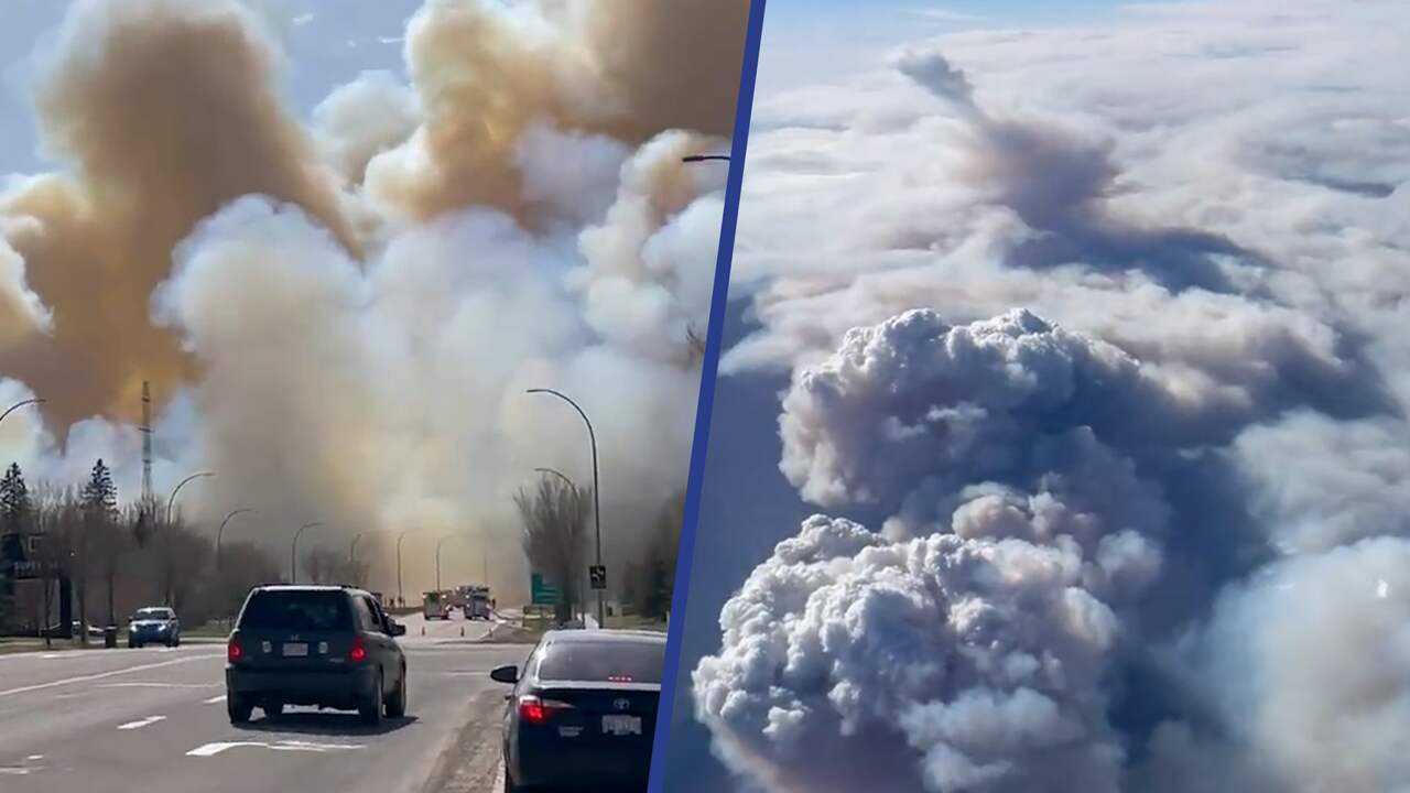 Beeld uit video: Vliegtuigpassagier filmt Canadese bosbranden die door wolkendek breken