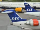 SAS planes and an Icelandair plane are parked waiting to be able to take off from Arlanda airport in Stockholm, on May 19, 2016.
No flights could take off from Arlanda airport due to a computer problem which led to the closure of Stockholm airspace. The problem has now been fixed according to Swedish air traffic control.
JOHAN NILSSON / TT News Agency / AFP