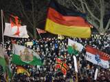 Duizenden demonstreren voor en tegen Pegida in Dresden