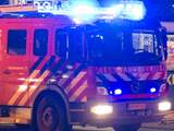 Persoon lichtgewond na brand in woning Geertruida Carelsenstraat