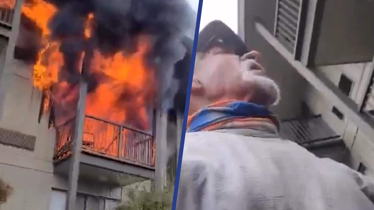 Beeld uit video: Hardloper helpt vrouw uit brandende Amerikaanse hotelkamer te springen