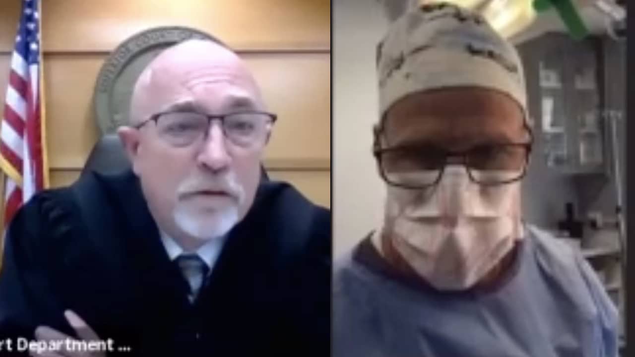 Beeld uit video: Amerikaanse chirurg verschijnt opererend in online hoorzitting