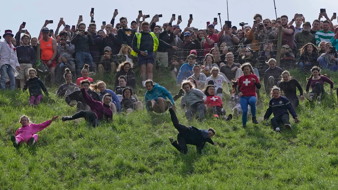 Unconscious Woman Best Cheese Roller in Annual Cheese Roll Race |  distinct