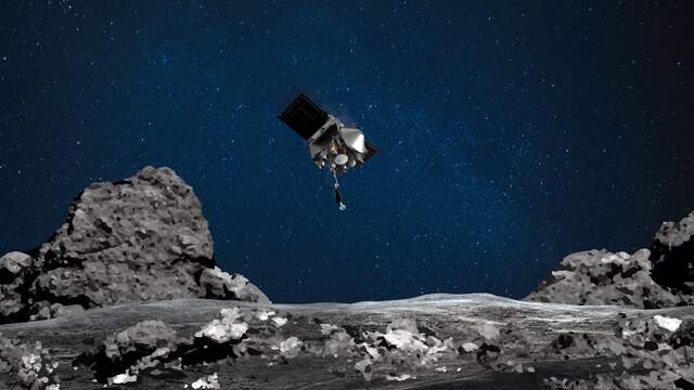 De ruimtesonde OSIRIS-REx doet onderzoek op de asteroïde Bennu.