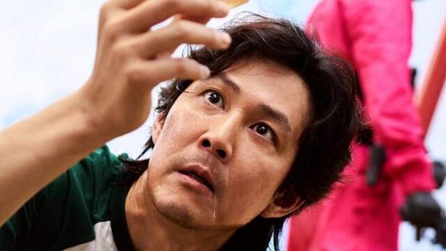 Lee Jung-jae speelt de hoofdrol in Squid Game.