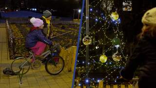 Inwoners Boedapest verlichten kerstversiering door te fietsen